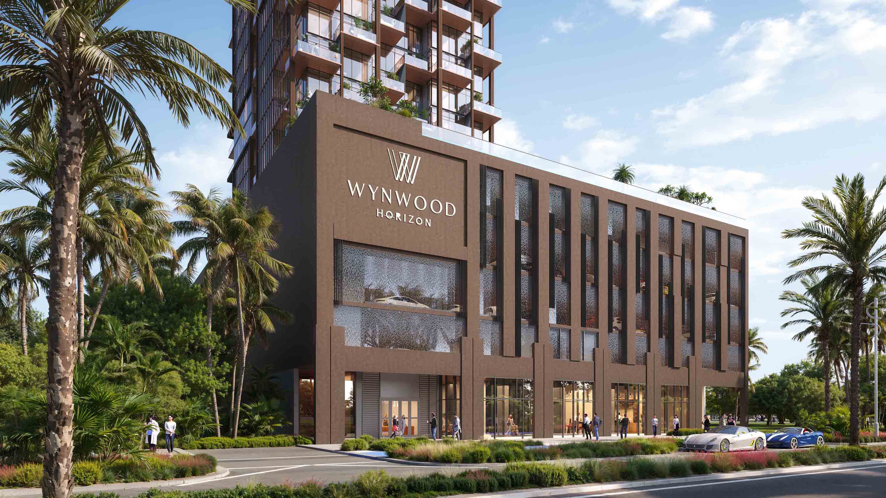 Wynwood Horizon By Imtiaz Wynwood Horizon building surrounded by palm trees, featuring modern architecture and people walking outside.